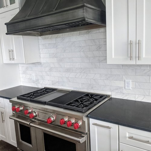 Tile flooring installation by Sunshine Carpet & Flooring in North Chelmsford, MA – porcelain tile in a modern kitchen