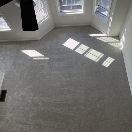 Carpet installation by Sunshine Carpet & Flooring in North Chelmsford, MA – plush neutral-toned living room carpet