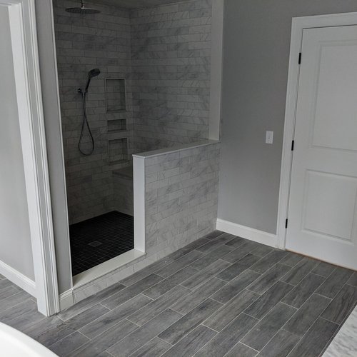 Tile flooring installation by Sunshine Carpet & Flooring in North Chelmsford, MA – porcelain tile in a modern kitchen