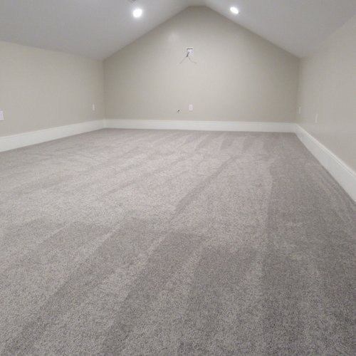 Carpet installation by Sunshine Carpet & Flooring in North Chelmsford, MA – plush neutral-toned living room carpet