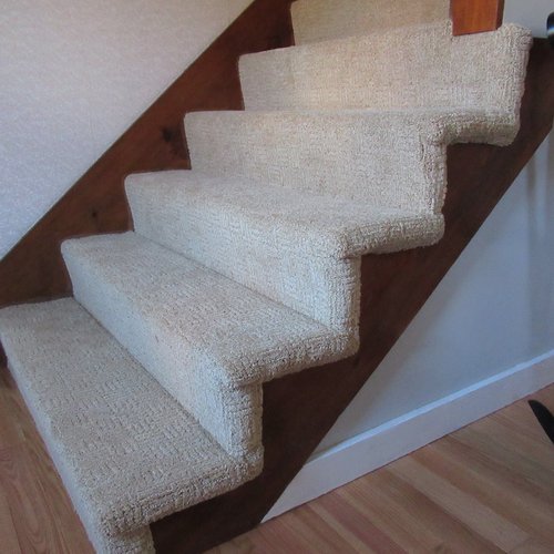 Carpet installation by Sunshine Carpet & Flooring in North Chelmsford, MA – plush neutral-toned living room carpet