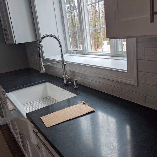 Tile flooring installation by Sunshine Carpet & Flooring in North Chelmsford, MA – porcelain tile in a modern kitchen